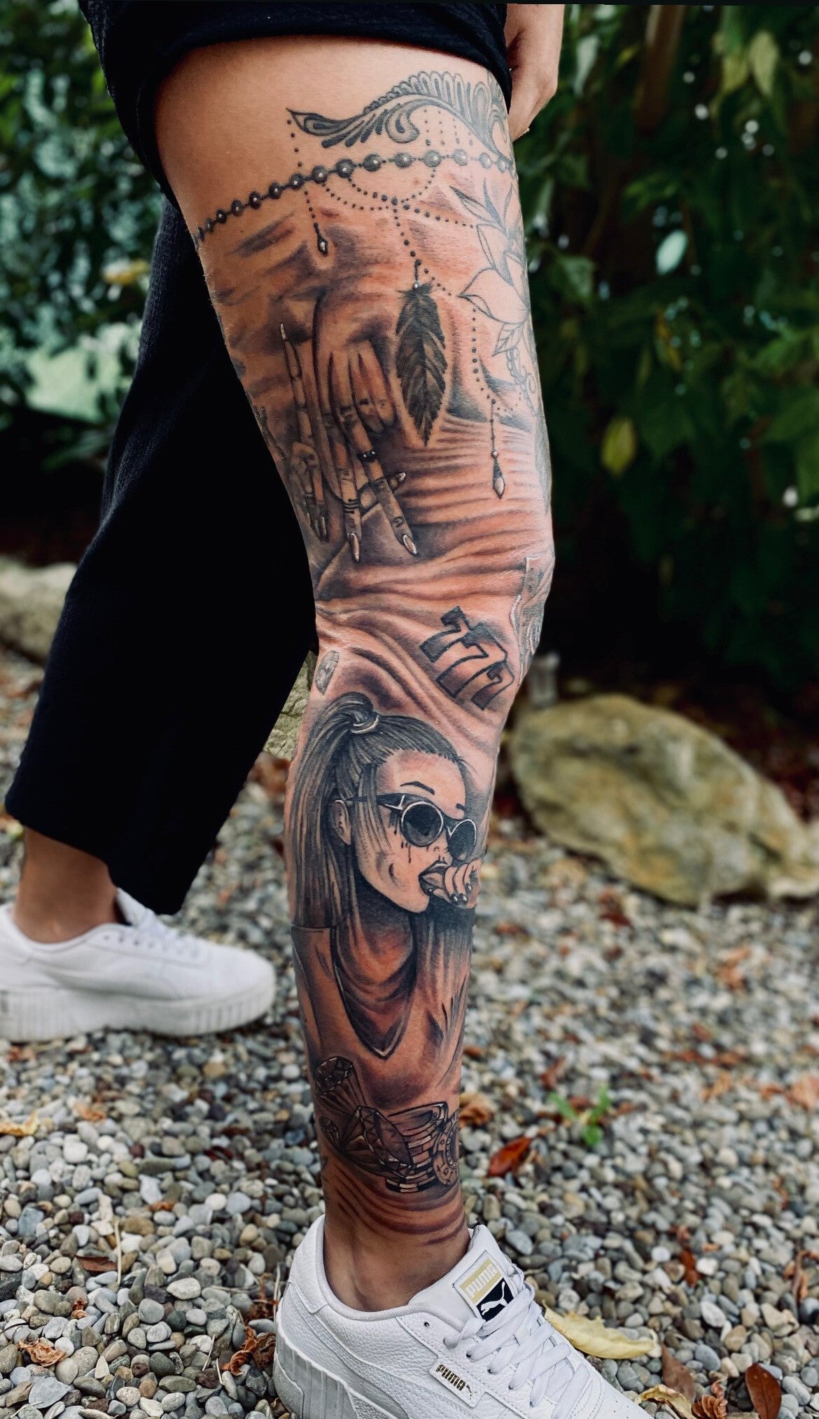 Black and grey leg sleeve tattoo by Golden Phoenix Tattoo Art