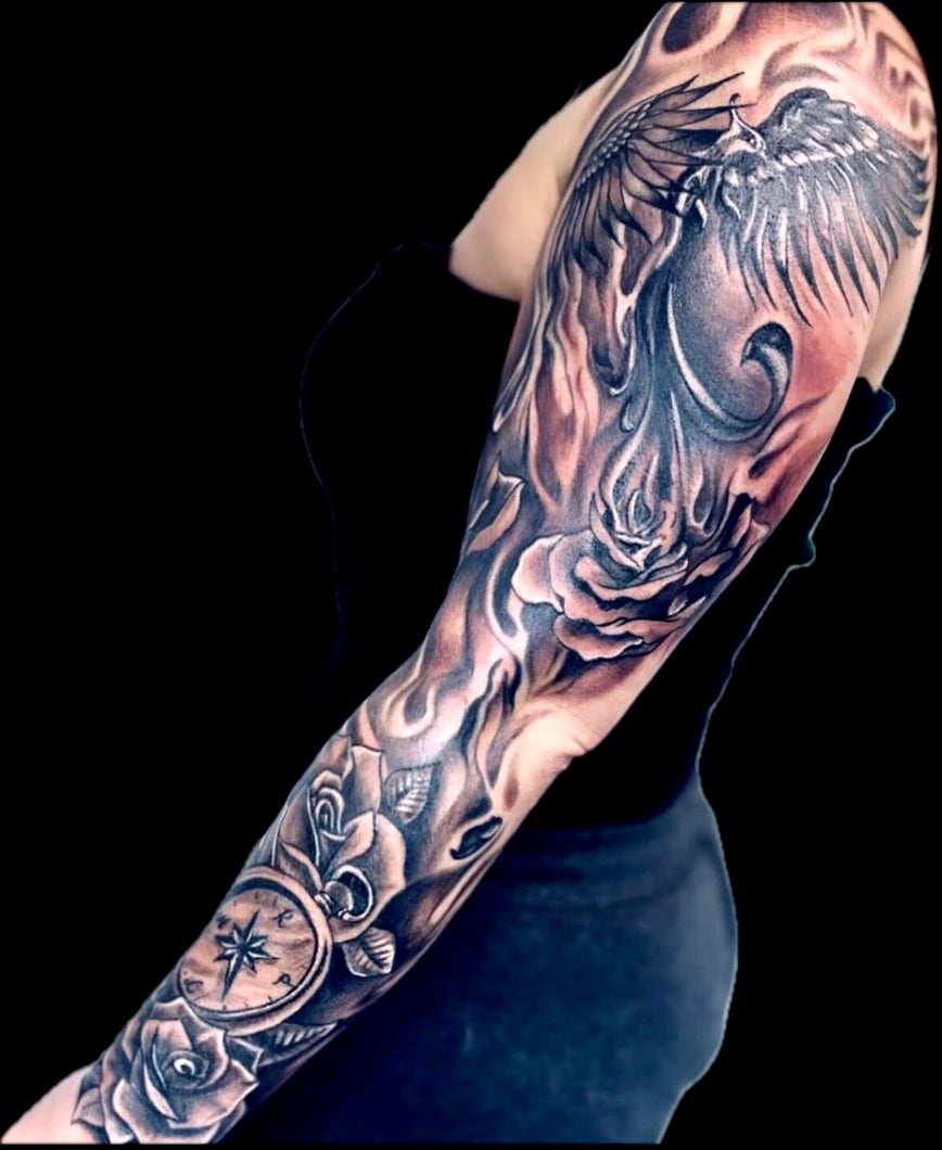 Custom tattoo work by Golden Phoenix Tattoo Art